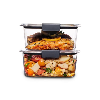 Rubbermaid Brilliance BPA Free Food Storage Containers with Lids stacked with grilled chicken and vegetable salad. Airtight, leak-proof, and microwave safe.
